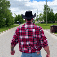 MEGcestregle smile surprise cowboy turn around GIF