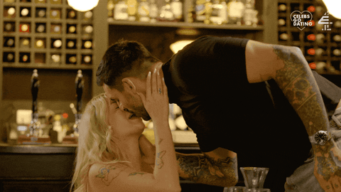 Table Kissing GIF by Celebs Go Dating