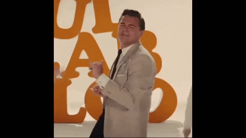 happy leonardo dicaprio GIF