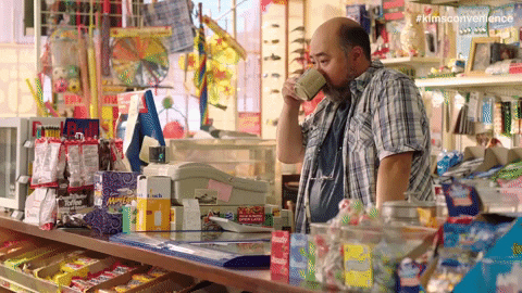 drinking coffee waiting GIF by Kim's Convenience