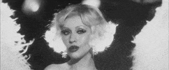 christina aguilera wink GIF