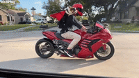 Corgi With Cape and Goggles Loves Motorcycle Rides