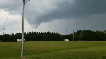 Funnel Cloud Darkens Sky as Storm Strikes Virginia
