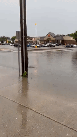 Floodwaters Clog Street in Western Ontario Following Thunderstorm