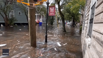 Motorists Drive Through Flooded Streets in Downtown Charleston, South Carolina