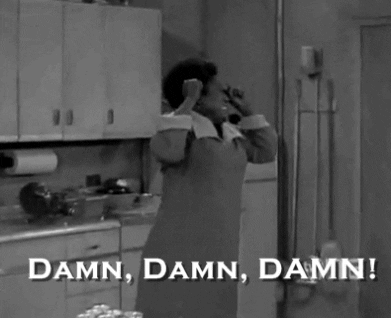 TV gif. Esther Rolle as Florida Evans from Good Times stands in a kitchen and shakes her fist and cries out "damn, damn, damn!" 