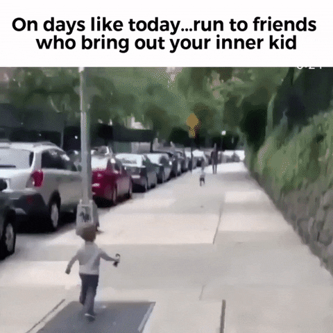 Meme gif. Two toddlers run toward each other on the sidewalk, their arms raised excitedly as they reach to hug one another. Text, "On days like today, run to friends who bring out your inner kid."
