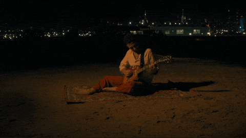 nouhisnomad giphyupload guitar nyc sand GIF