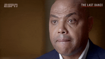 Sports gif. We zoom in for a close-up on a worried-looking Charles Barkley, whose jaw drops slightly as he looks away from us.