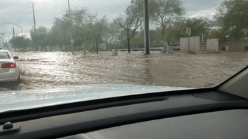 Floodwaters Spill Through Streets in Arizona