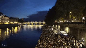 Parisians Party on Banks of Seine as France Lifts Curfew