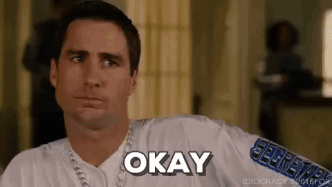 Movie gif. Luke Wilson as Joe Bauers from Idiocracy wears a deadpan expression and says, "Okay," which appears as text.