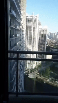 'Do You Think We Should Leave?' Woman Watches Buildings Sway From 39th Floor During Manila Quake
