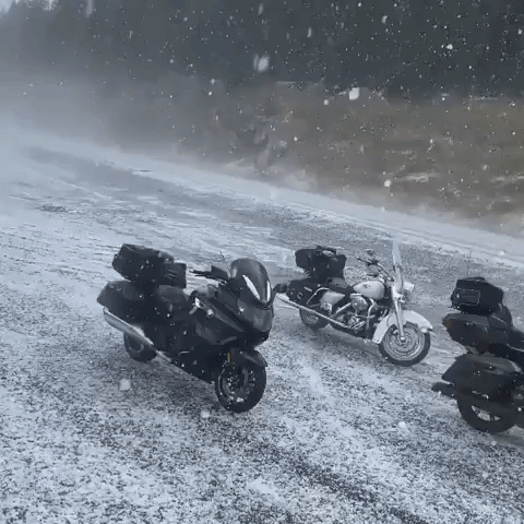 'I'm Still Getting Hit': Sturgis-Bound Motorcyclists Shelter From Hail Inside Construction Equipment