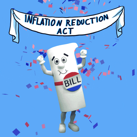 Digital art gif. Person costumed as a smiling legislative bill pumps their hands in the air against a blue background. Above them, a white banner reads “Inflation Reduction Act.” Confetti falls along with four balloons that read, “Lower priced prescription drugs, Expanded healthcare, Corporations paying their fair share, Largest climate investment.”
