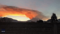 Sunrise Illuminates Ash and Smoke Following Explosion at Mexico's Popocatepetl Volcano