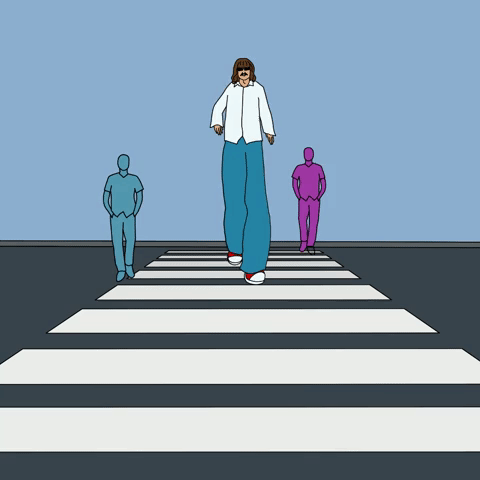 Giant man crossing the road