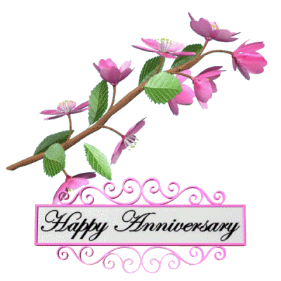 Digital art gif. An animated pink sakura cherry blossom branch telelates against a white background above a rolling pink scrollwork sign that reads, "Happy Anniversary"