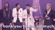 TV gif. Matthew Ramsey, the lead singer of the band Old Dominion, giving an acceptance speech at the 2024 ACM Awards. The text overlay at the bottom reads, 'This is absolutely insane.'