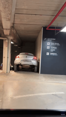 Car Stuck on Stairs in Brazilian Parking Garage After Wrong Turn