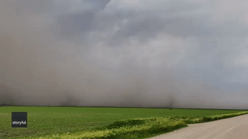 Extreme Winds Blow Dust and Debris Toward Vehicle in North Dakota
