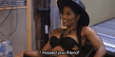 Reality TV gif. Wearing a black cowboy hat and a strappy black top, K. Michelle of Love and Hip Hop leans back and says flirtatiously, “I missed you friend!”