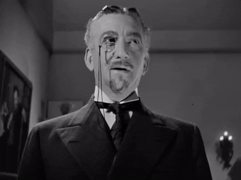 Movie gif. We look up at John Litel as Dr. Flegg in The Return of Dr. X as he wears a monocle and sternly says, "Go back to your work." 