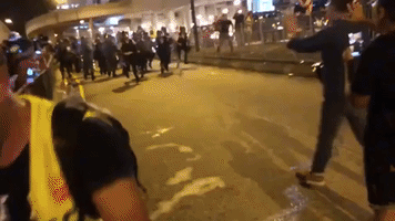 Violence Breaks Out Between Protesters and Police at Kwai Chung Police Station