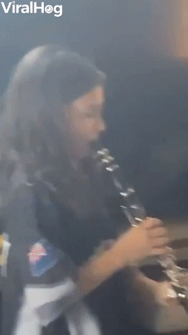 Baby Sister Confused By Clarinet