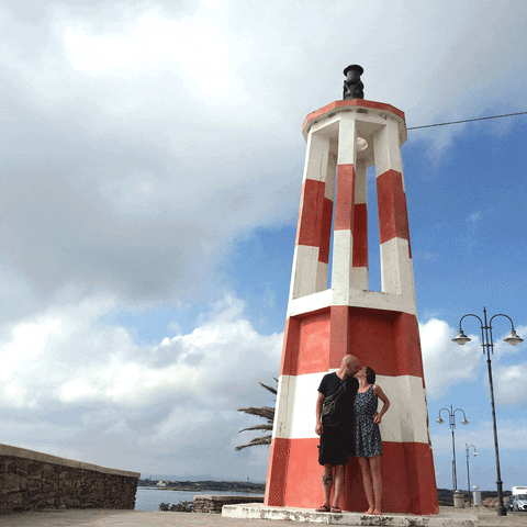 neroQuette giphyupload kiss lovers lighthouse GIF