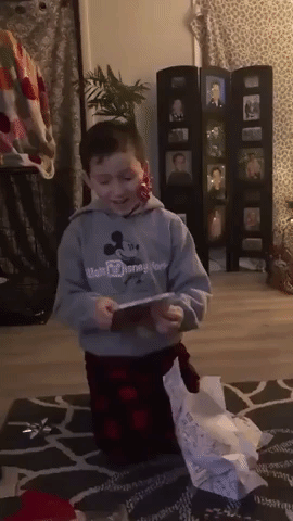 This Boy's Sweet Reaction When He's Surprised With Ariana Grande Tickets for Christmas Will Make Your Day