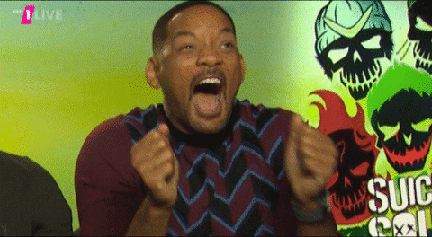 Celebrity gif. Will Smith clenches his fists in excitement as he smiles ecstatically with his mouth hanging open as if to scream.