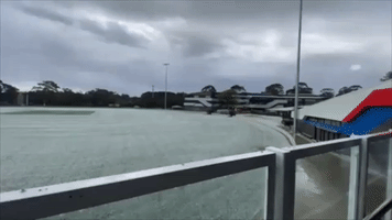 Hailstorm Whitens Melbourne Cricket Grounds