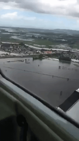 Video From Airplane Shows Devastating Flooding in New Zealand Town