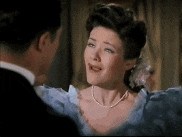 Movie gif. Gene Tierney as Martha in Heaven Can Wait runs off and flops dramatically on a couch, crying.