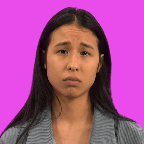 Video gif. Woman looks at us with a pout as milky cartoon tears pool in her eyes and drip down her cheeks in front of a magenta background.