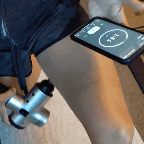 triathletemag giphyupload recovery triathlon theragun GIF