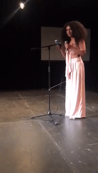 Woman Raps About Social Injustice at Open Mic Night