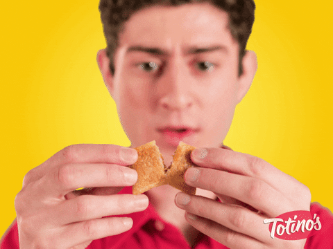 Ad gif. Young man pulls a Totino's pizza roll in half, a small whiff of steam escapes, and the boy says, impressed, "whoa, hot."