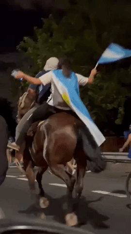 Argentina Fans on Horseback Celebrate 