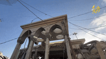 People Sift Through Rubble After Strike on Mosque in Khan Yunis