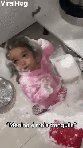 Little Girl Makes a Mess with Flour