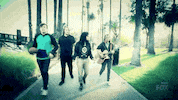 walking playing guitar GIF by American Idol