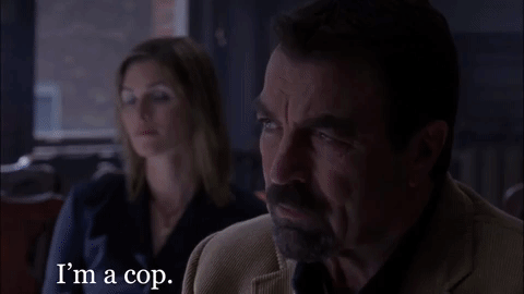 stone cold cop GIF