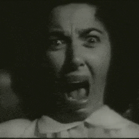 the screaming skull horror movies GIF by absurdnoise