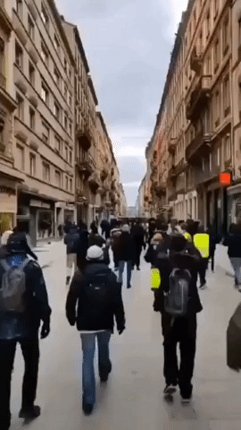 Chanting Crowd Marches Through Streets of Lyon During Violent Yellow Vest Protests