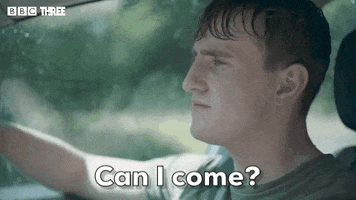 TV gif. Paul Mescal as Connell on Normal People sits in the driver seat of a car with his hand on the steering wheel. He turns his head to look towards the passenger seat, his hair is wet and pressed down. He says with an earnest look, “Can I come?”