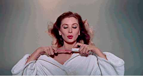 suzy parker toothpaste GIF