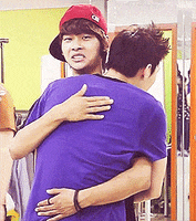 awkward hug GIF