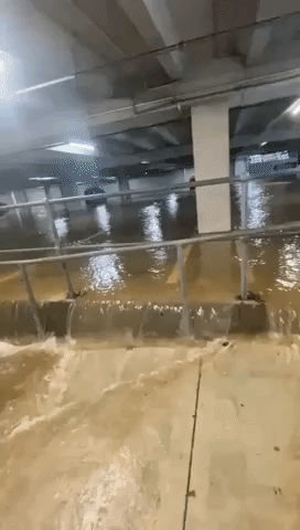 Auckland Parking Lot Inundated Amid Deadly Floods